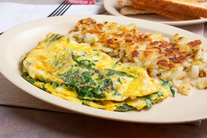 Omelette and hash brown breakfast