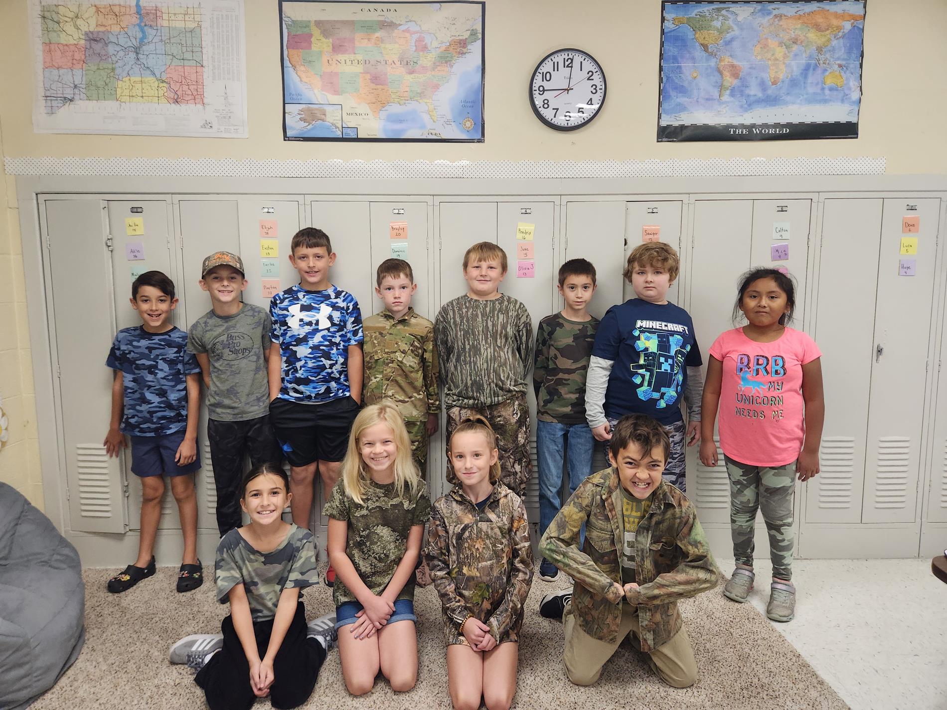 students are dressed up in their camo gear for red ribbon week 