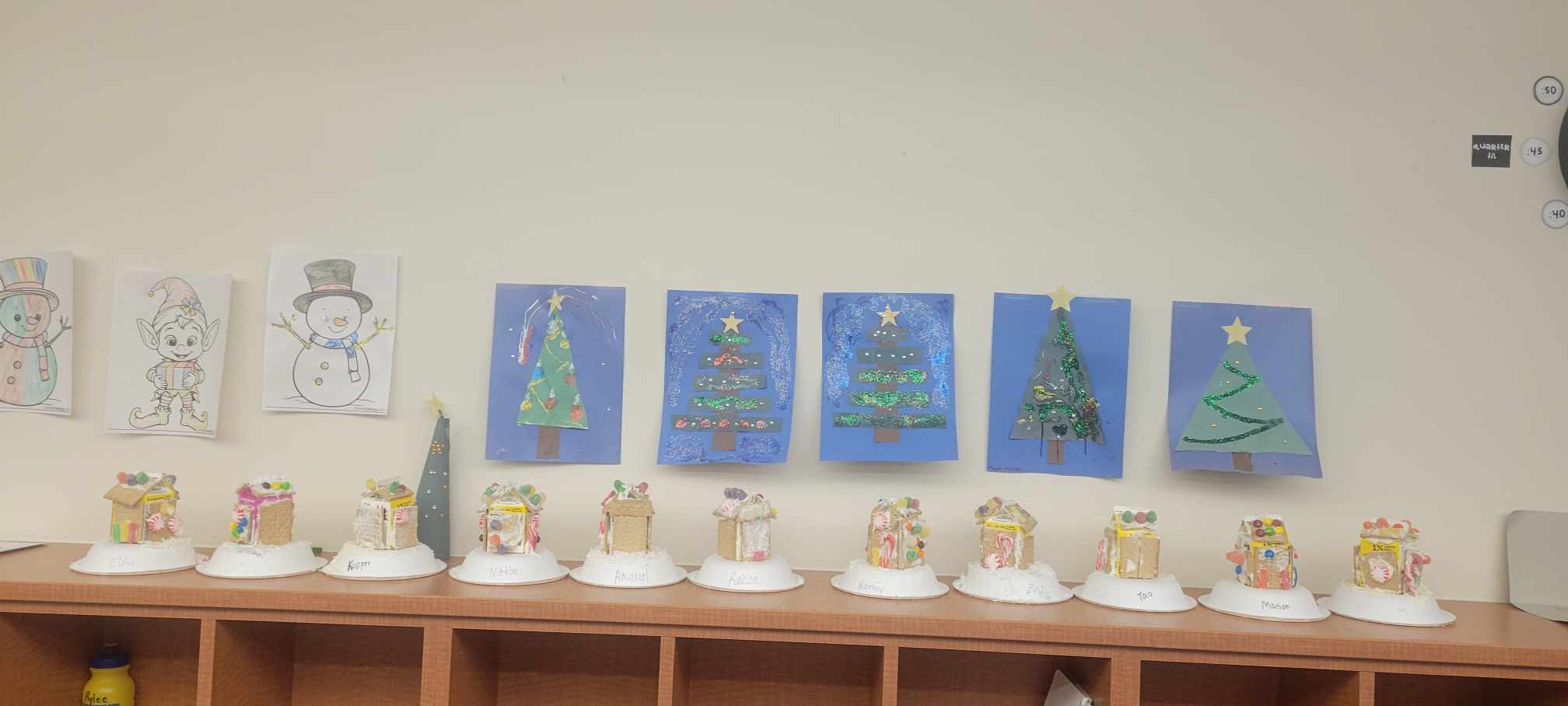 Gingerbread houses displayed on a table