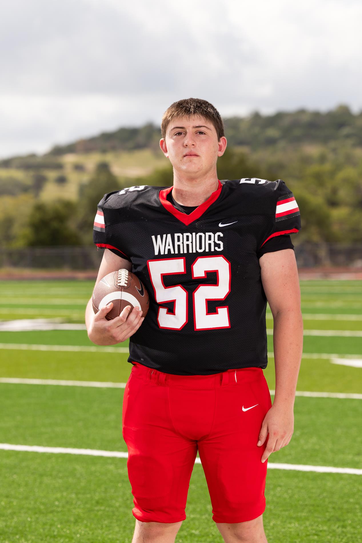 52 BRAYDEN SMITH, OL/DL, JR