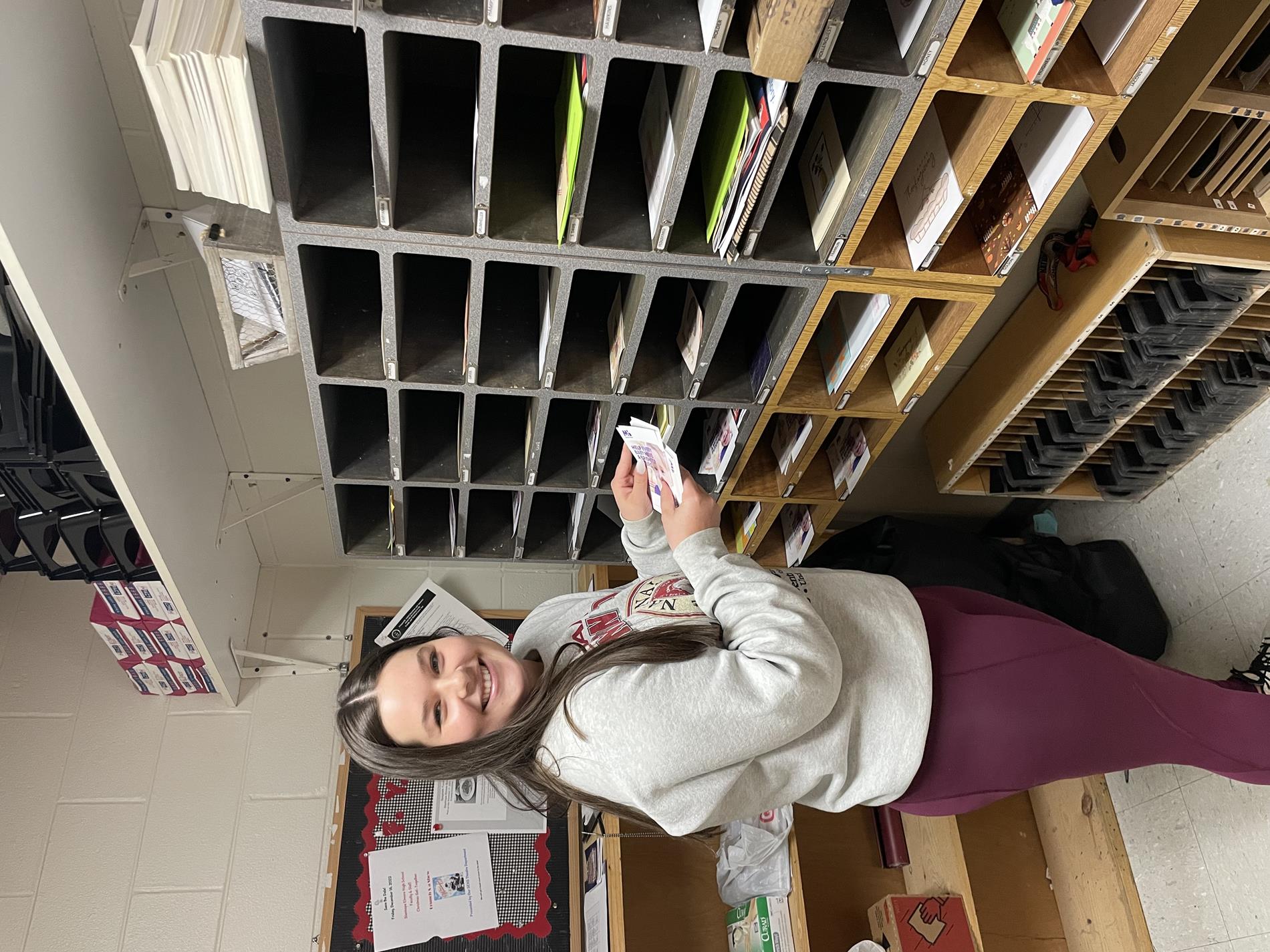 Alli Lightsey filling teacher boxes with candy grams.