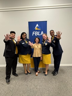 FBLA District 5 Workshop with new chapter Millbrook Middle School Member, council member Paxton, and FBLA State Secretary, Jared.