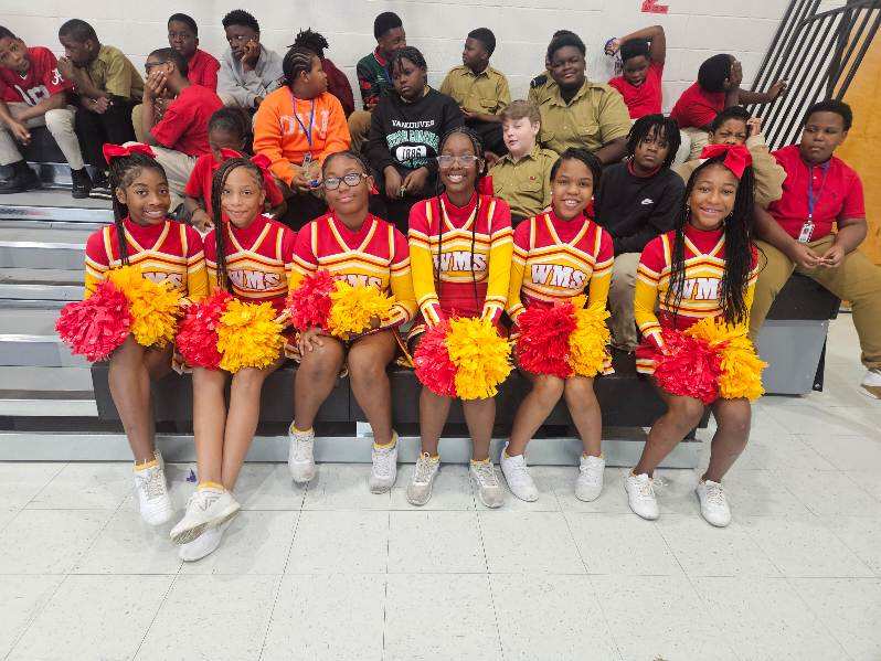 Cheerleaders sitting