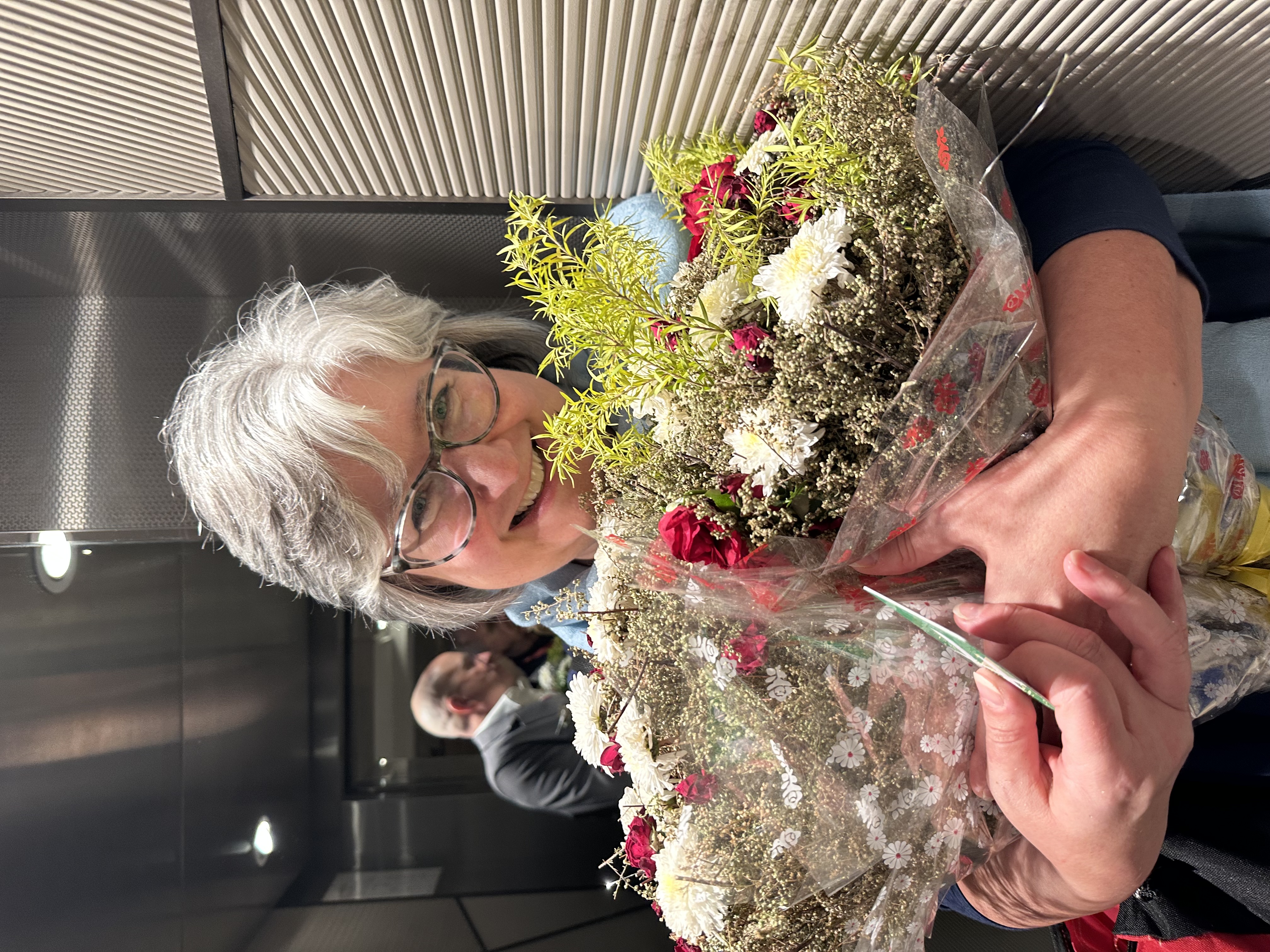 Dr. Donna Waldron from Campbell University receiving flowers
