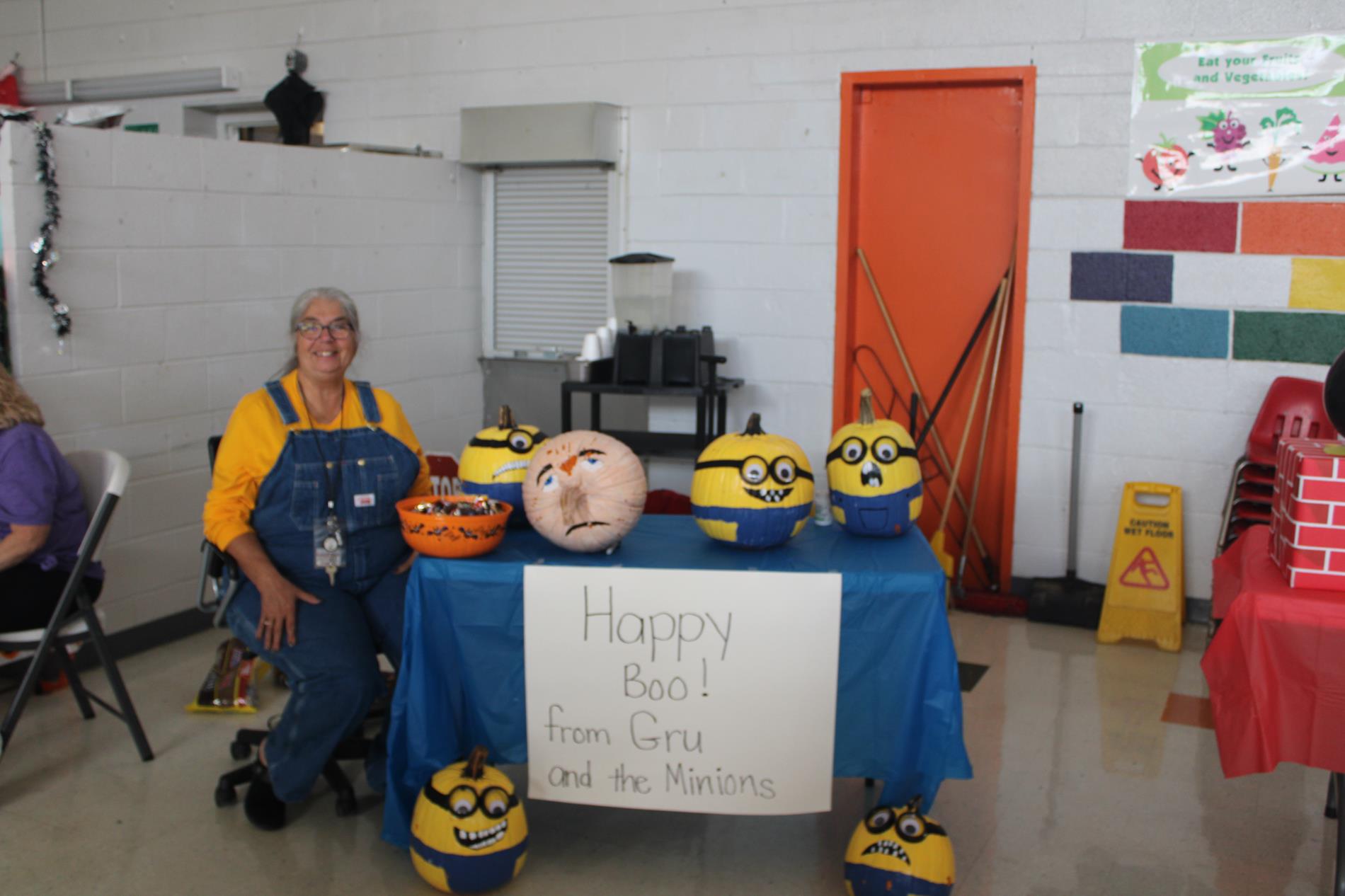 librarian dressed for halloween trunk or treat minion