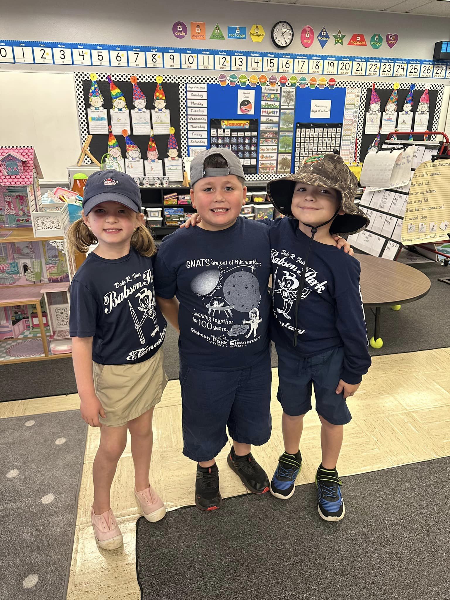 Gnats wearing hats to celebrate Hats Off To Reading on our first day of Literacy Week.