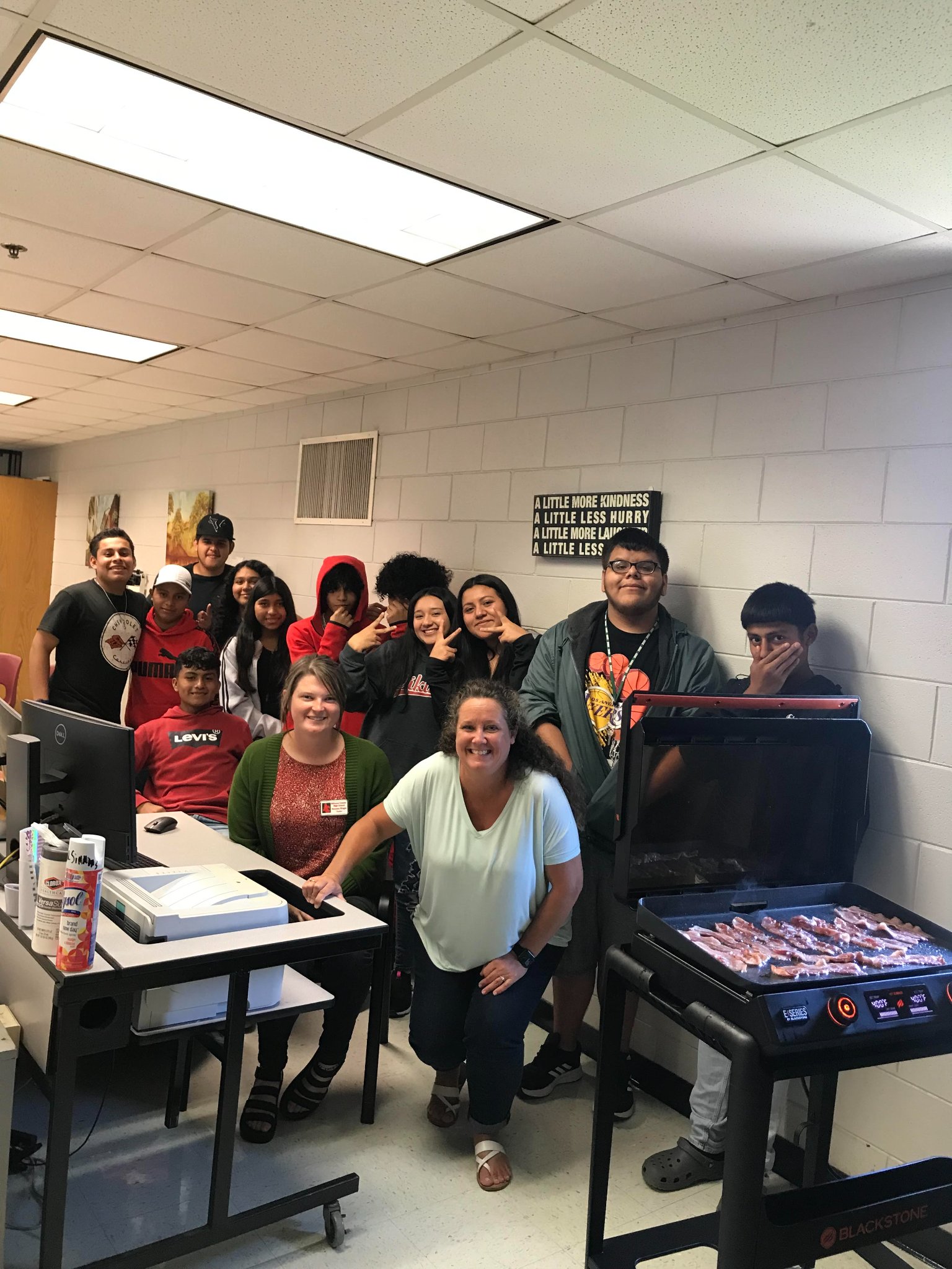 Ms. Bree and Ms. Tina's class learn about English verbs by following a recipe.