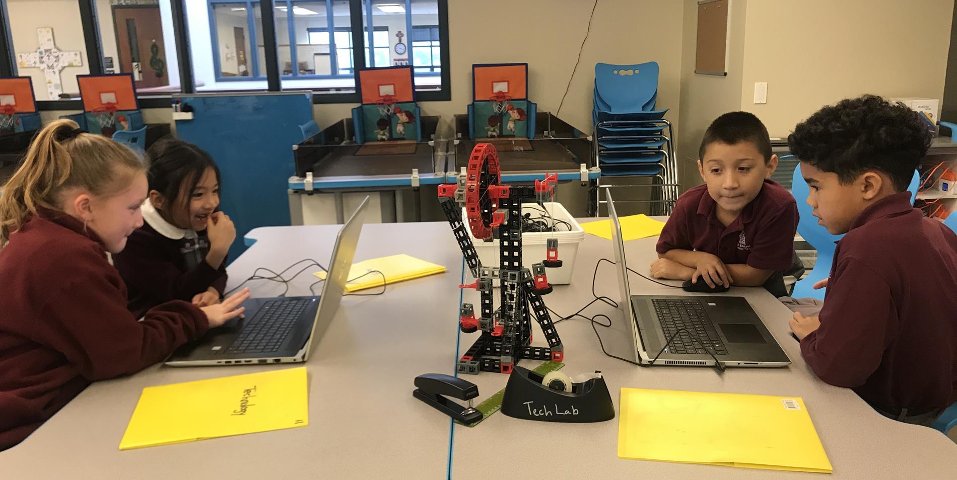 Kids using Laptops