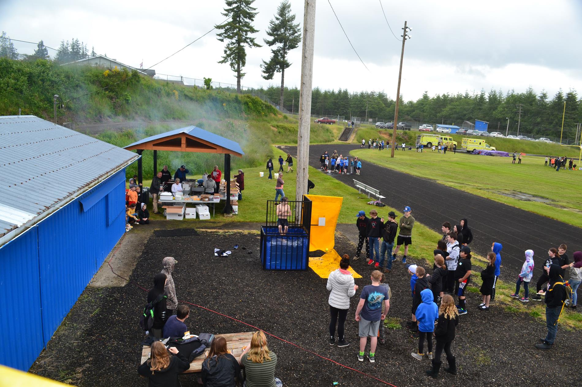 Students playing at the dunk tank