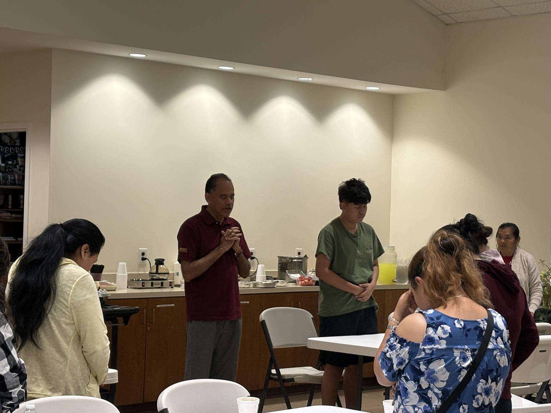 Father offers prayer