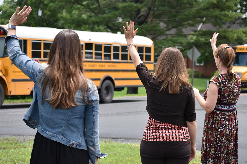 Teachers waving