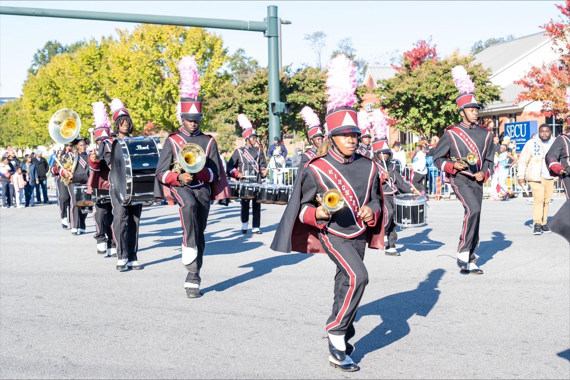 Kingstree high school marching band students marching in parade