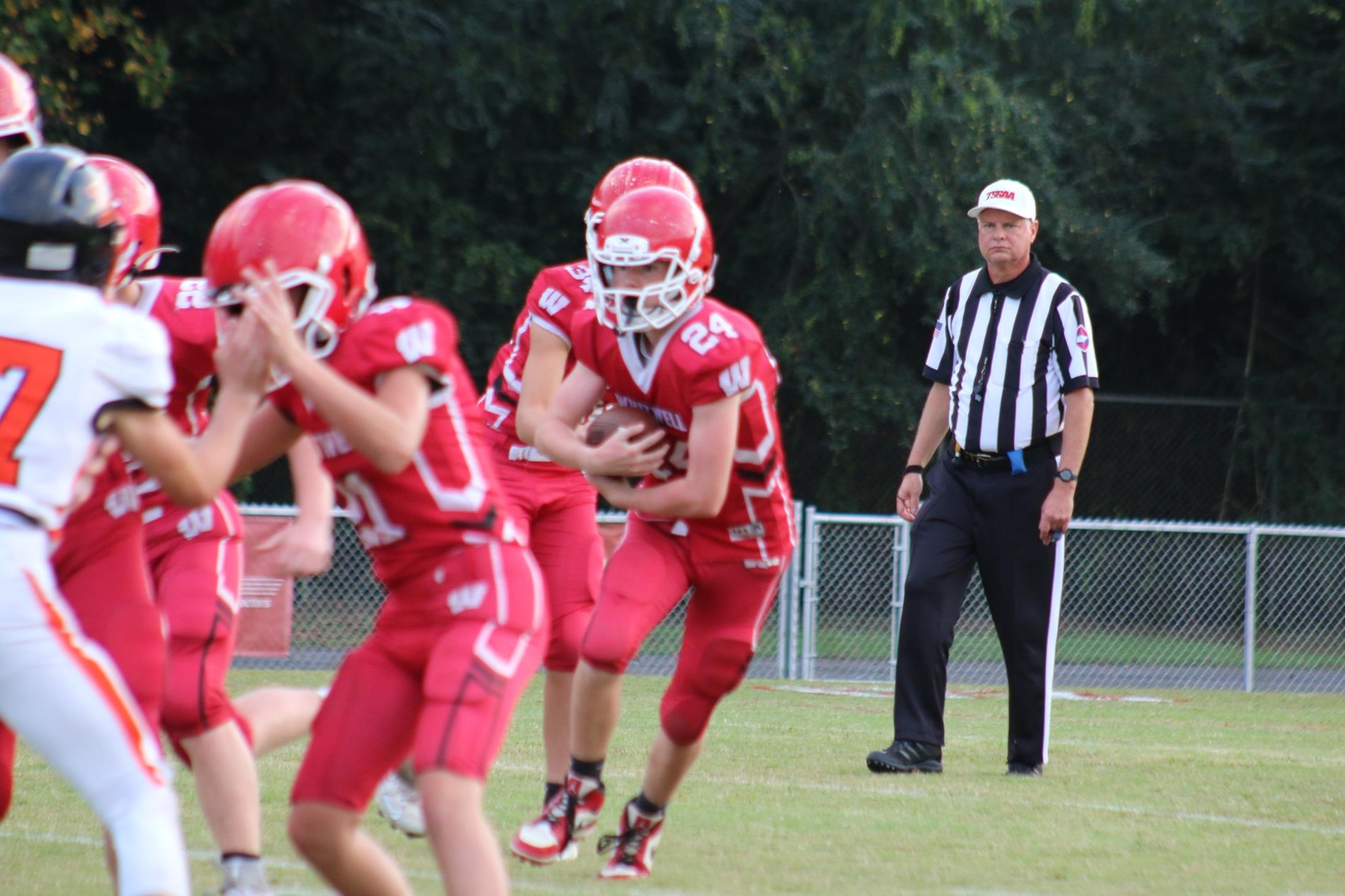 WMS Football carrying the ball