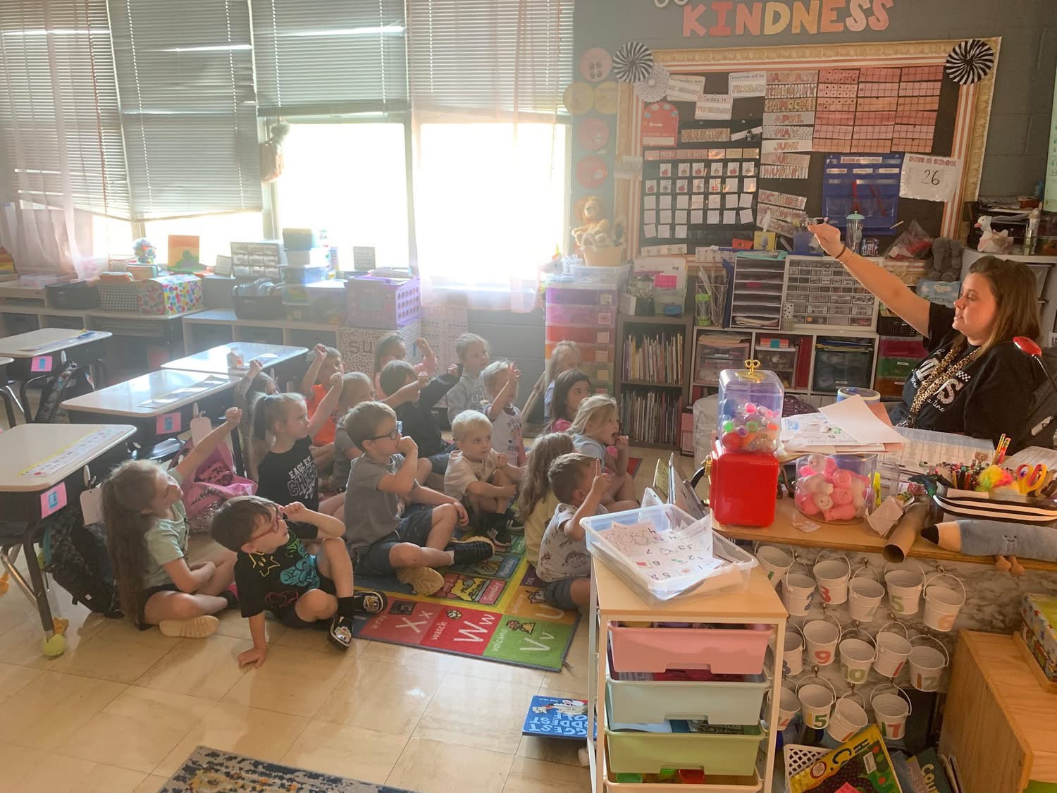 teacher reading to her students