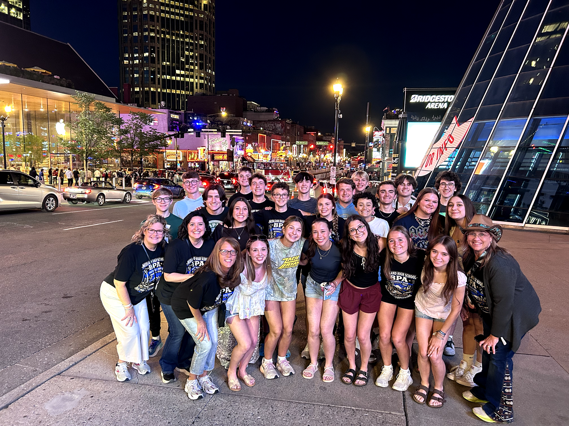 The entire group of BPA students and advisors pose on Broadway Street in Nashville