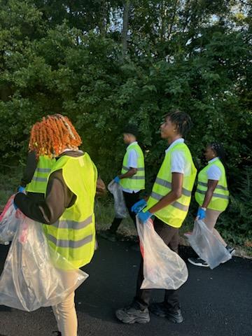 Law & Public Safety & Educator Prep Doing Community Service Cleaning the Campus of HSHS/Juniors and Seniors Community Service