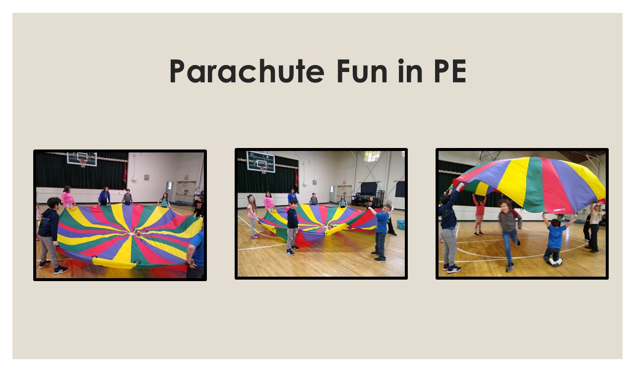 Students play with a parachute in PE