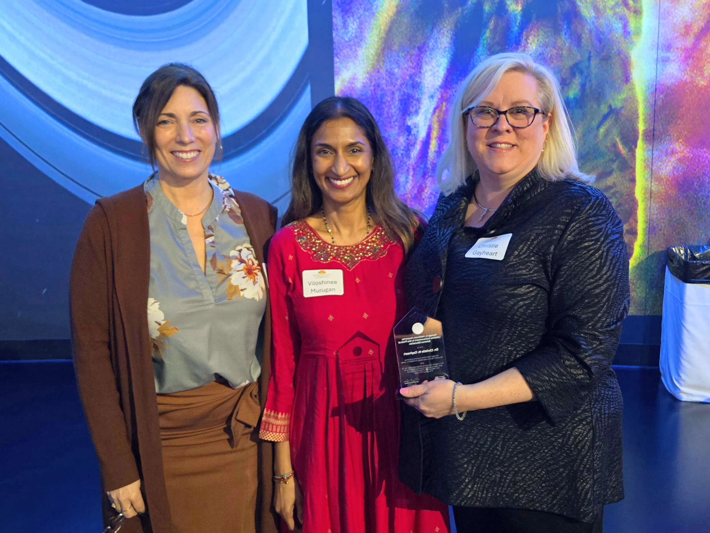 Dr. Christie Gayheart (right) with Jefferson Middle School principal Shannon Blasy and Secondary Curriculum Specialist Viloshinee Murugan at the MSTA conference