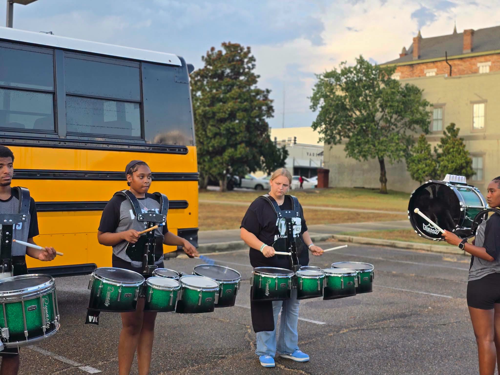 West Point High School band percussion students perform outdoors during the United Way 50K Your Way Giveaway.