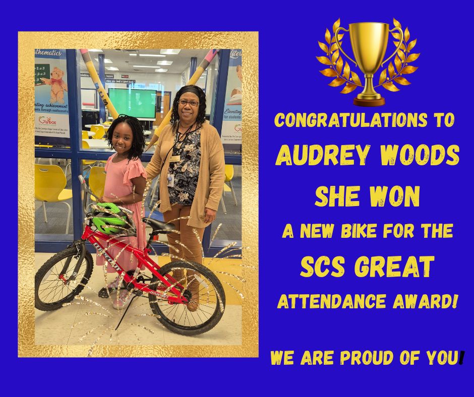 Audrey Wood wins bicycle for attendance award
