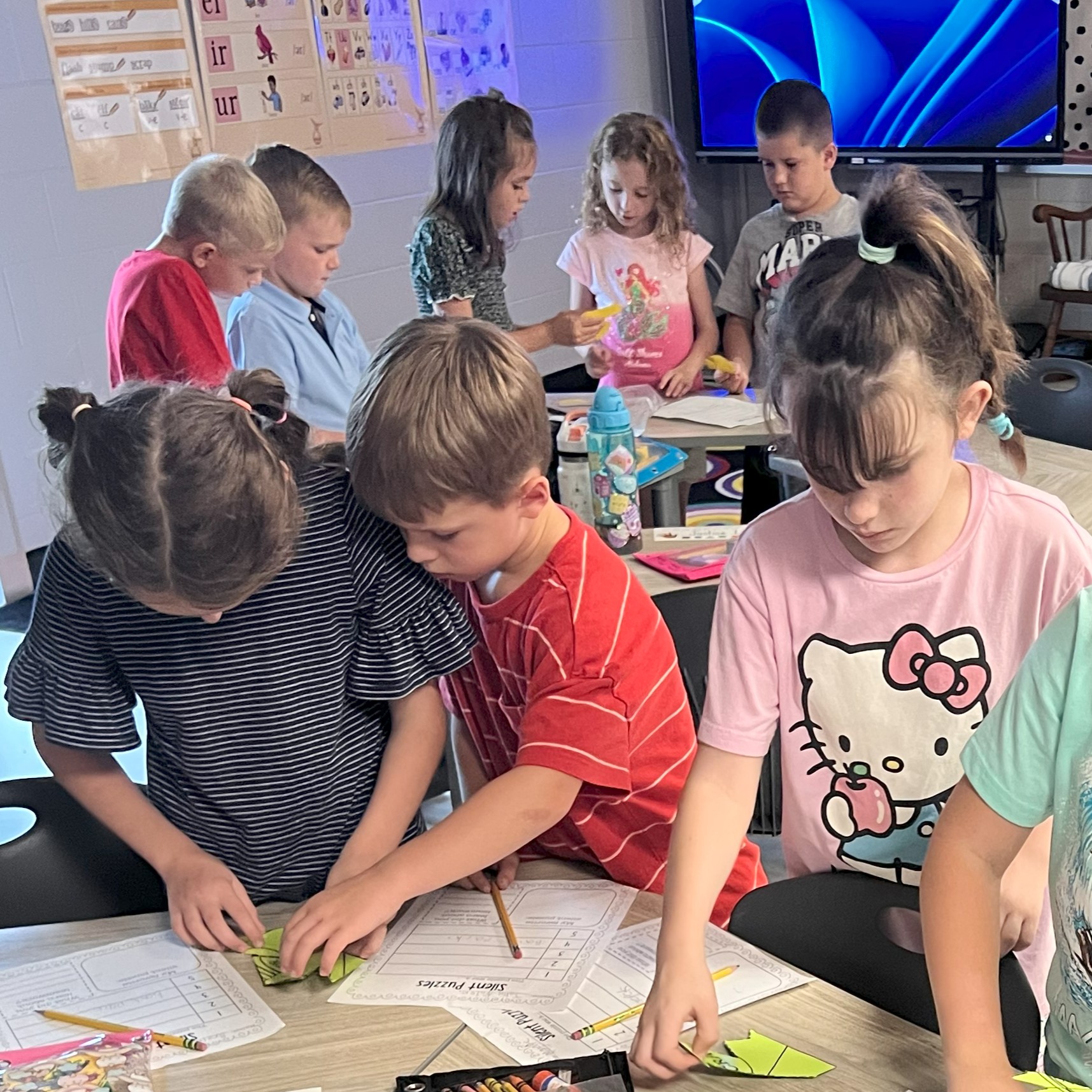 Student helping each other with a puzzle
