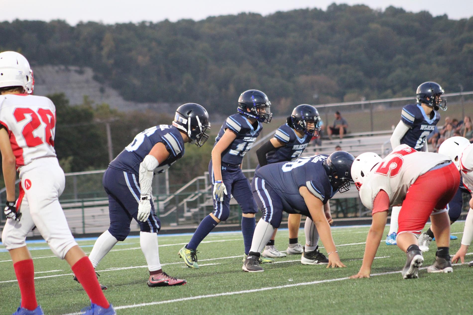 FCHS football players on field.