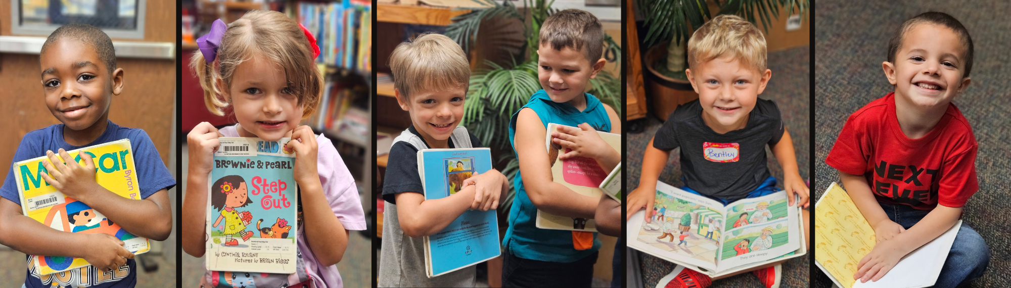 students holding books