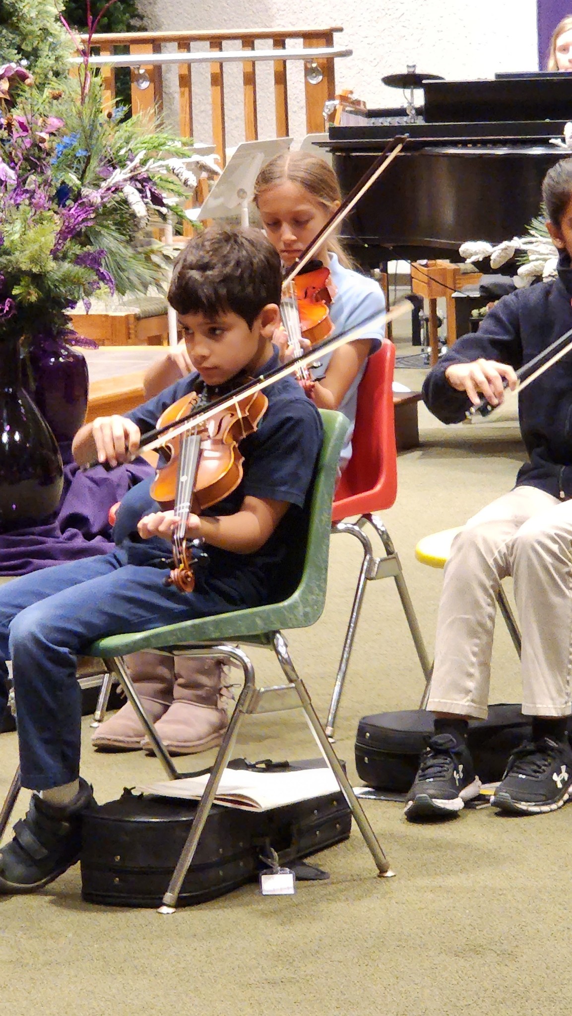students playing string instruments
