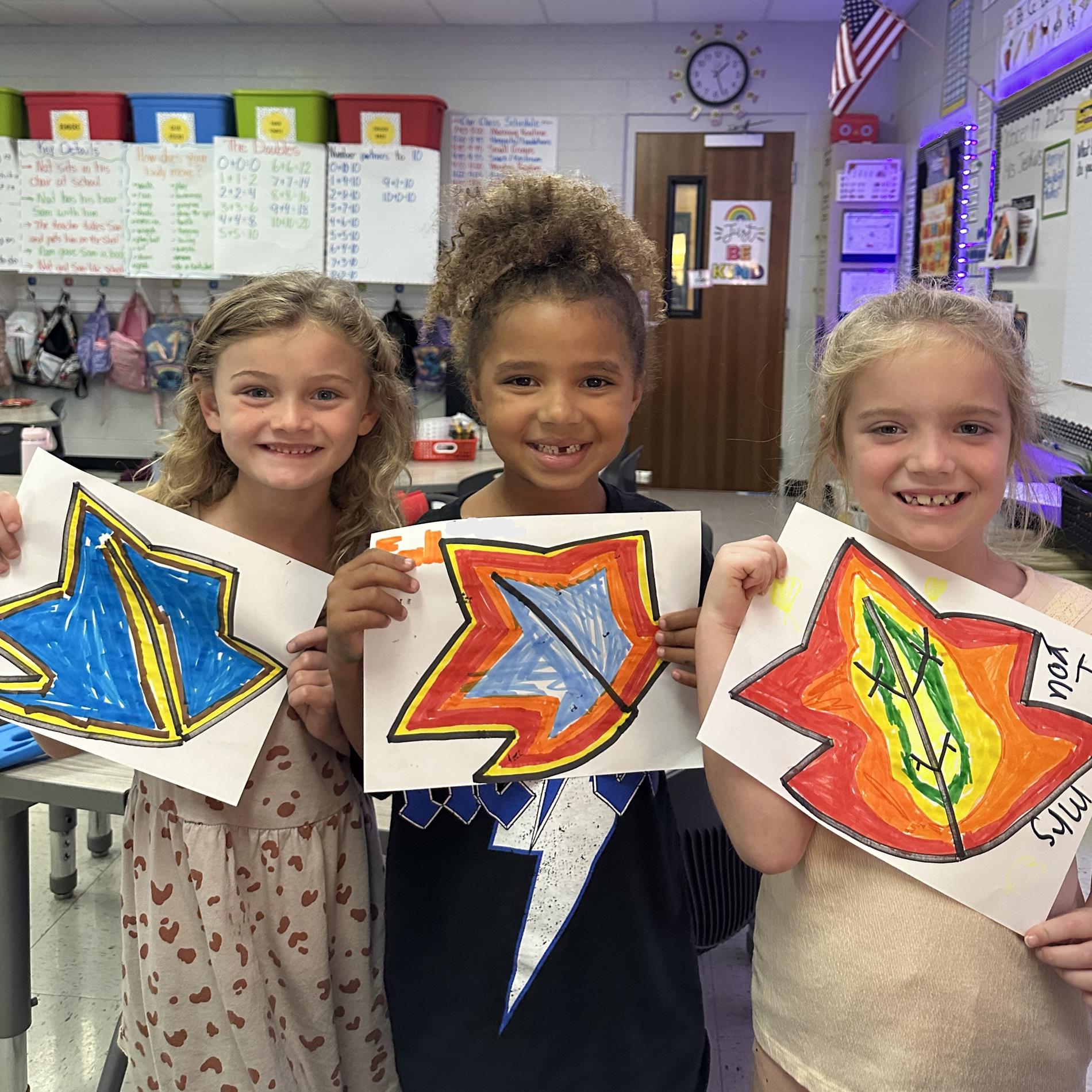 Students show off their classwork