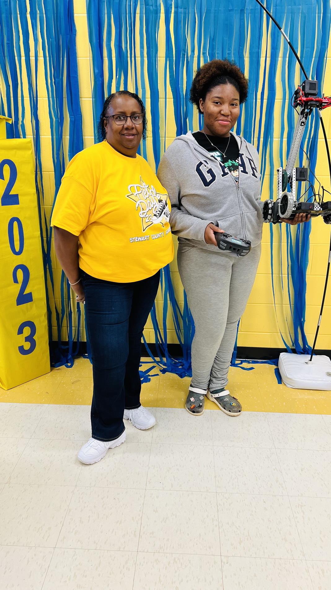 Scholar Z. Spencer with Administrative Assistant Mrs. Rivers