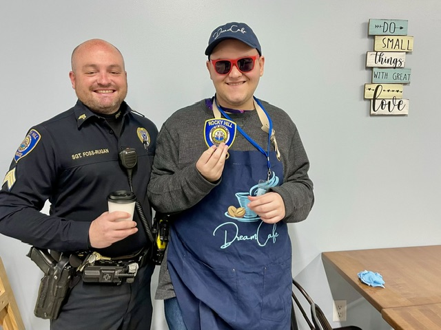 Local police officers visit the cafe
