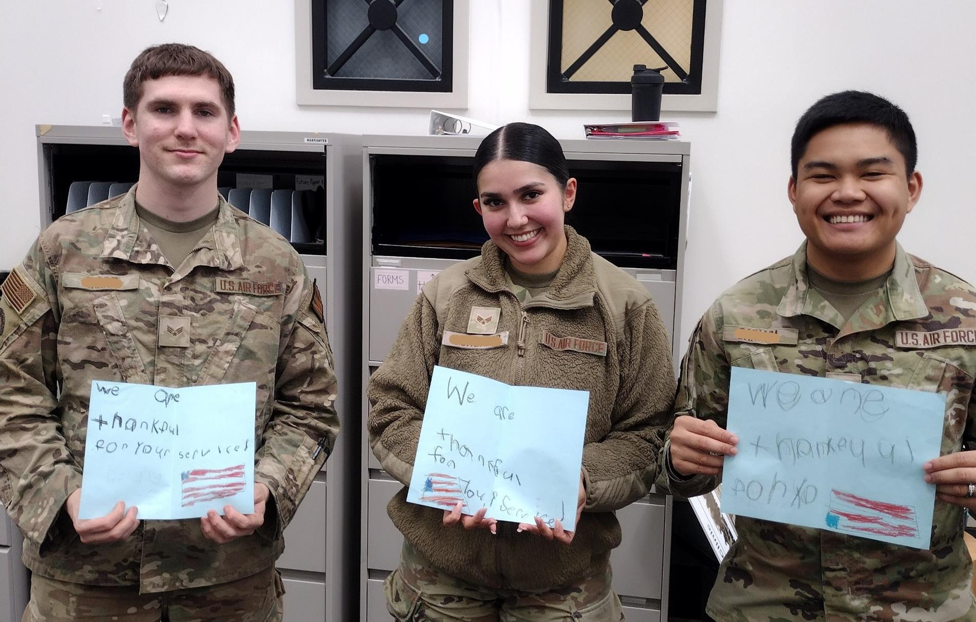 Military Members with Thank you Cards