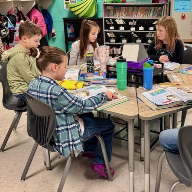 3rd grade students in class