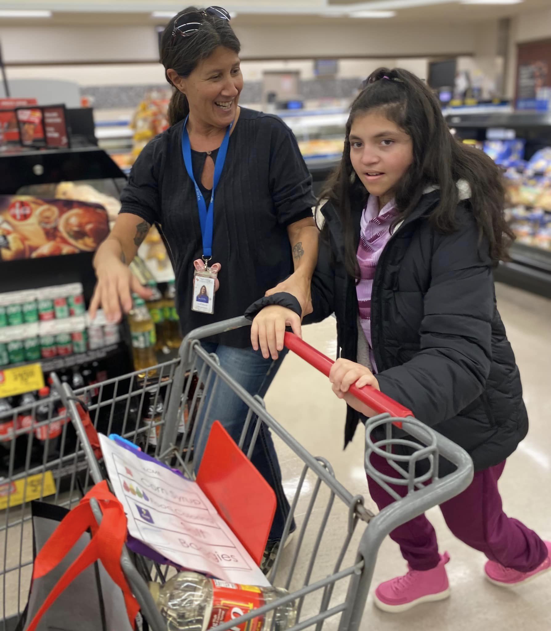 student and teacher at supermarket