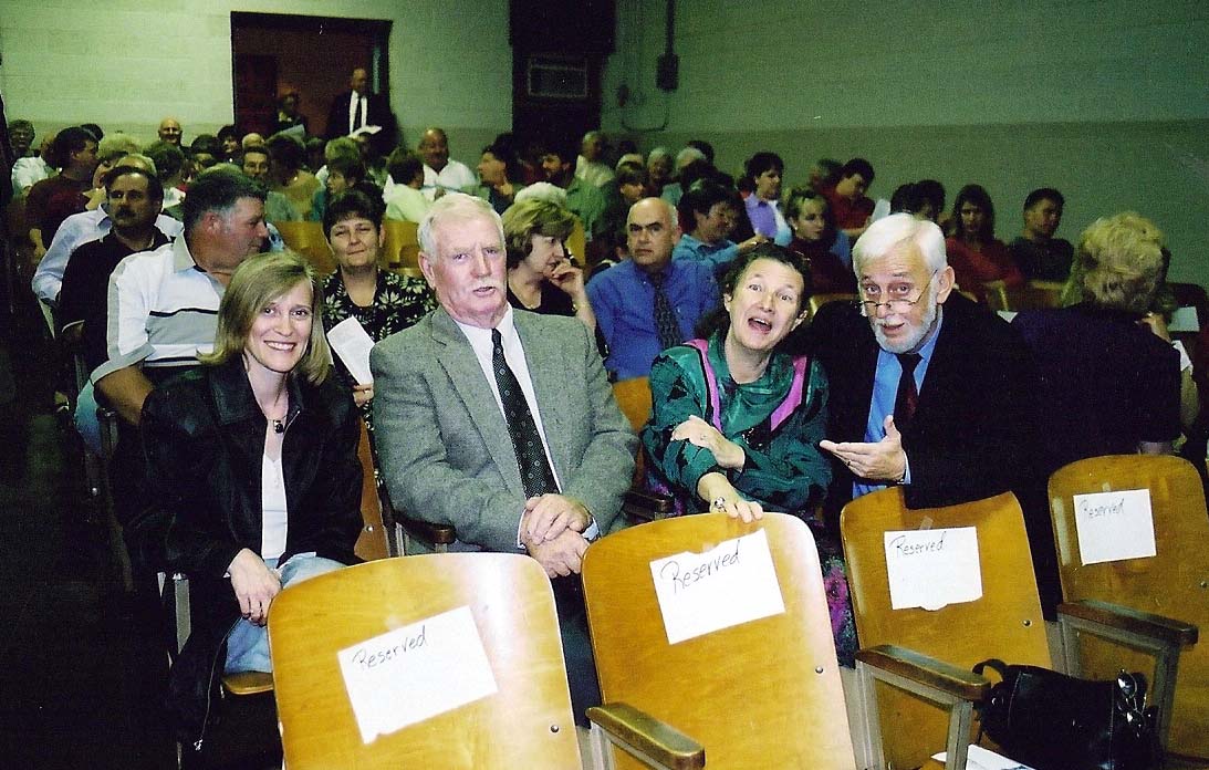 Peter and Dagmar Hildebrand Schroeder with the Higdons at a ceremony in the old WMS auditorium