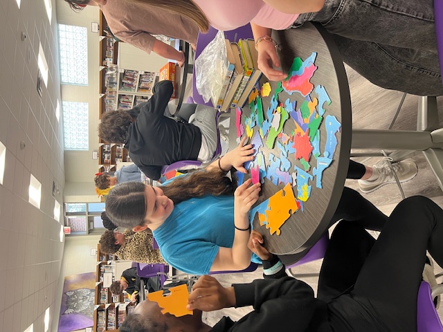 Students put together Map Puzzles