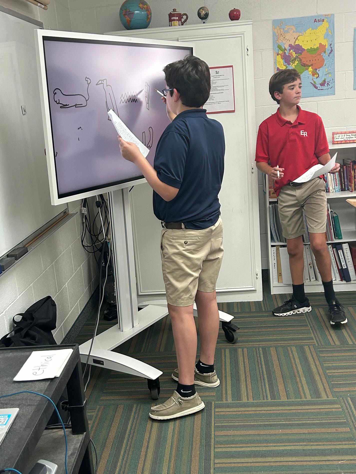 Students using smart boards Students using smart boards