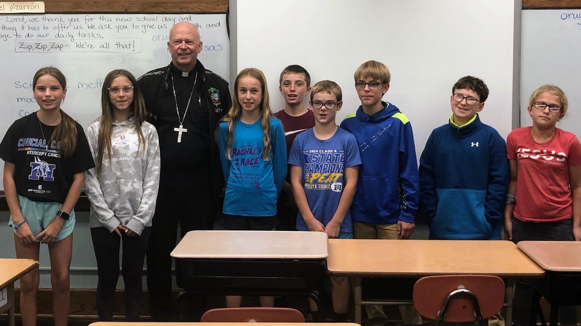 Children Standing with the Bishop