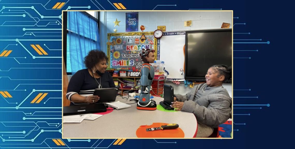 Student Interacting with RoboKind with Mrs. Miller