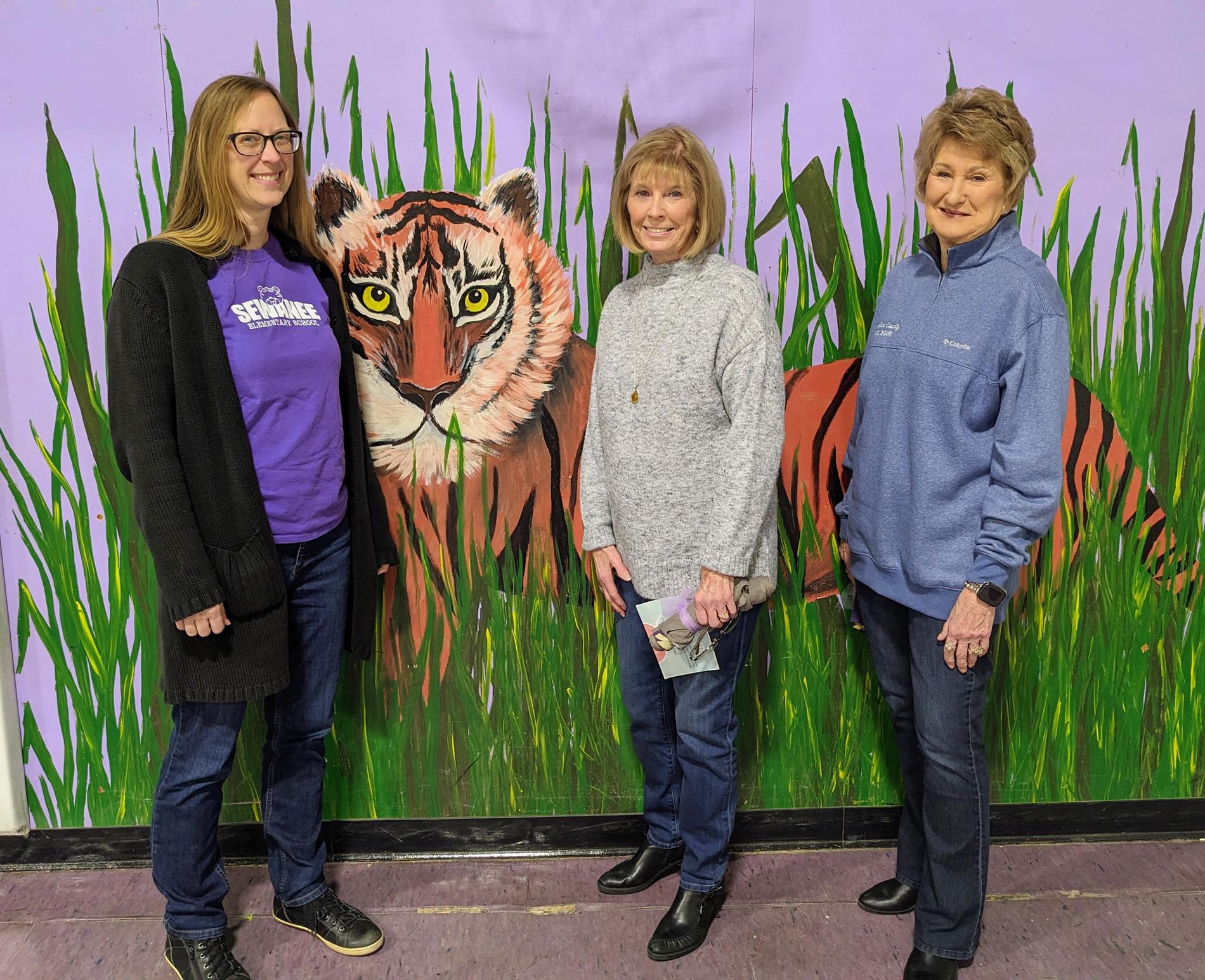 photo of 3 school board members that visited SES