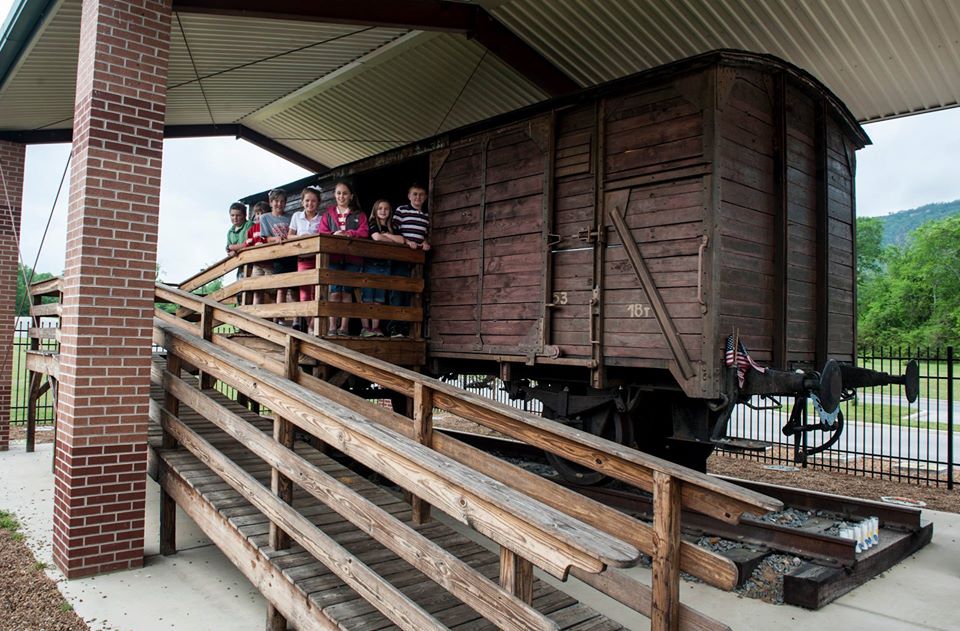Students standing on railcar platform