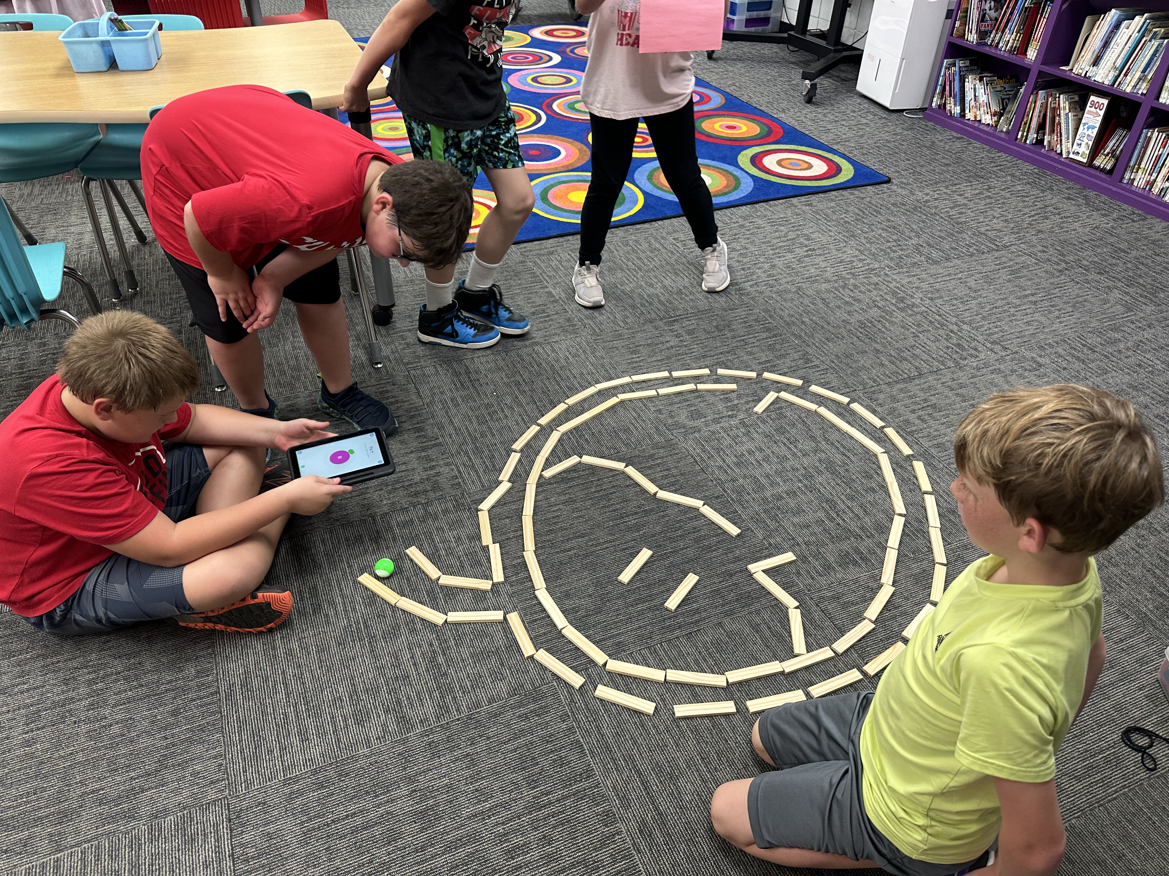 Students designed a pumpkin shaped racetrack for the Sphero mini.