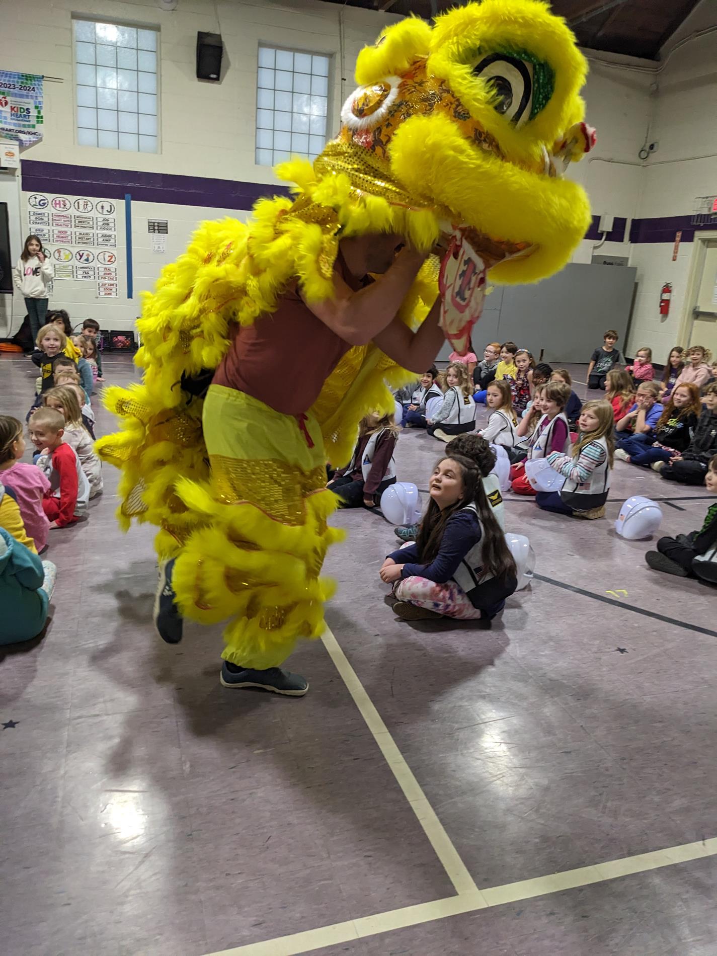 Person in snake costume performing the lion dance