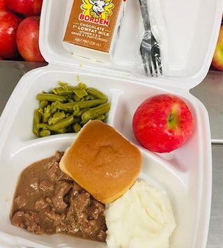 Beef Tips, Mashed Potatoes, Green Beans, Whole Grain Roll, Apple and Lowfat Milk