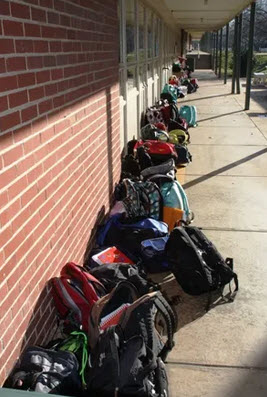 backpacks on sidewalk