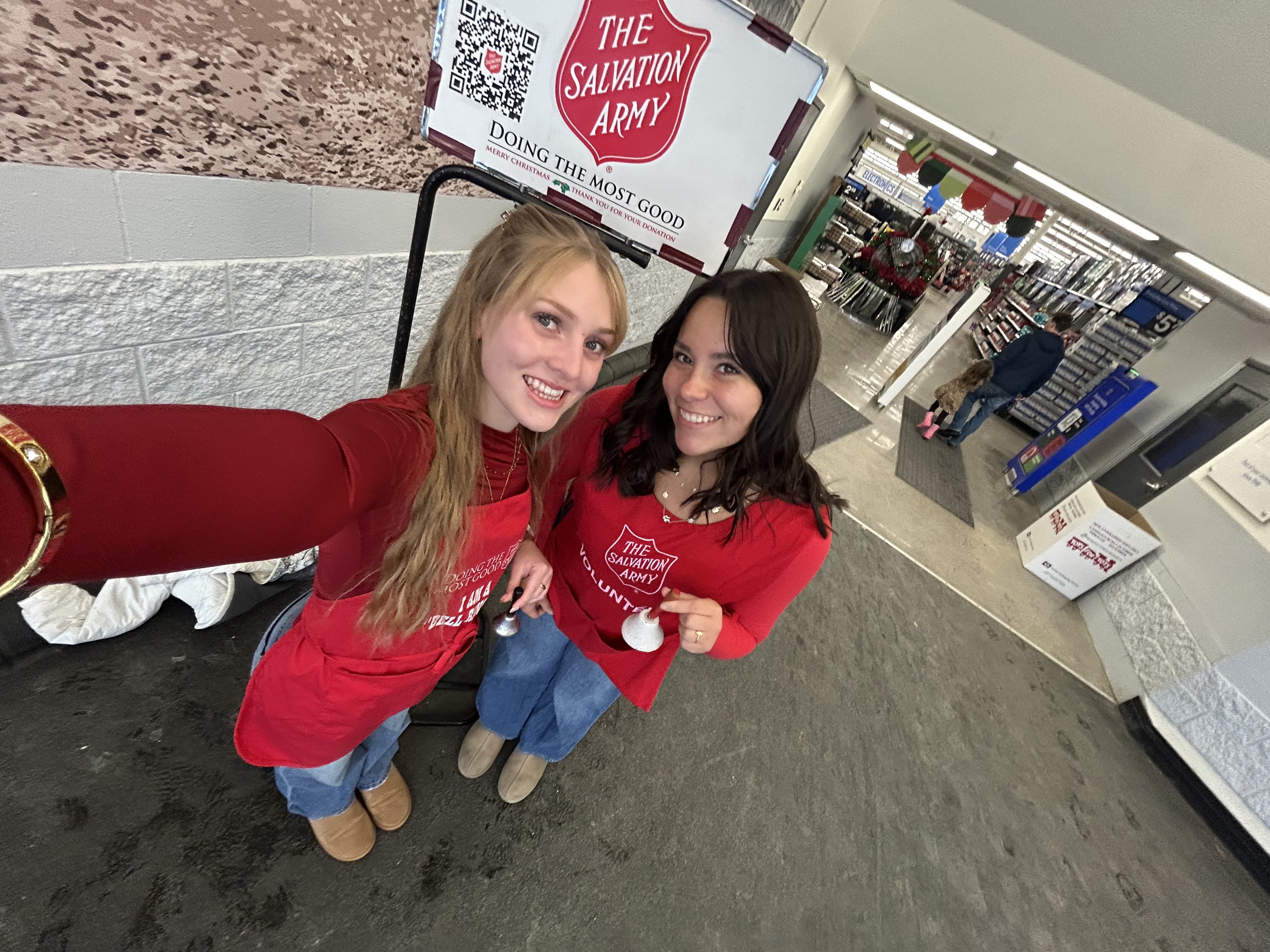 Students Ringing the bell for Salvation Army