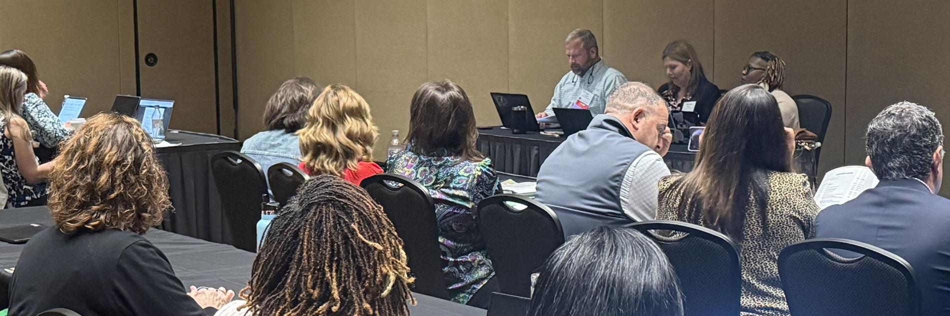 people at G-CASE conference