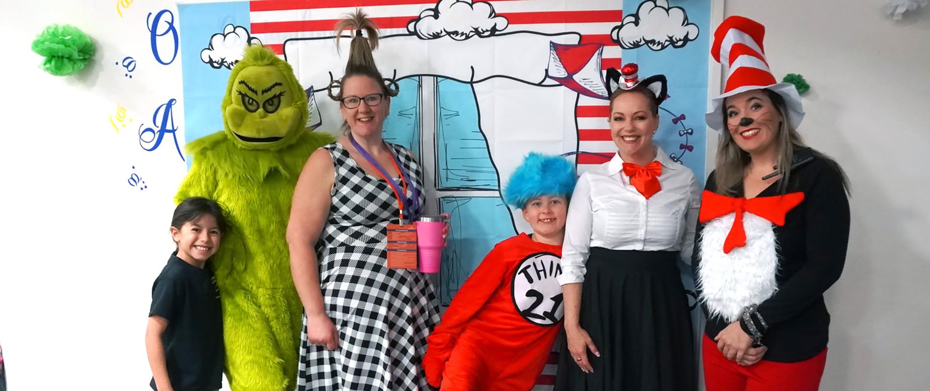staff and students show off outfits for Dr. Seuss day