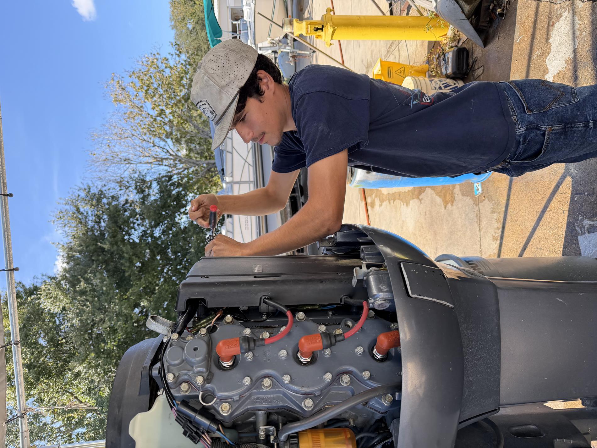 student working on a motor