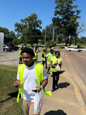 Law & Public Safety & Educator Prep Doing Community Service Cleaning the Campus of HSHS/Juniors and Seniors Community Service